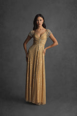 Gold Sequined Evening Gown With Embellished Shoulders