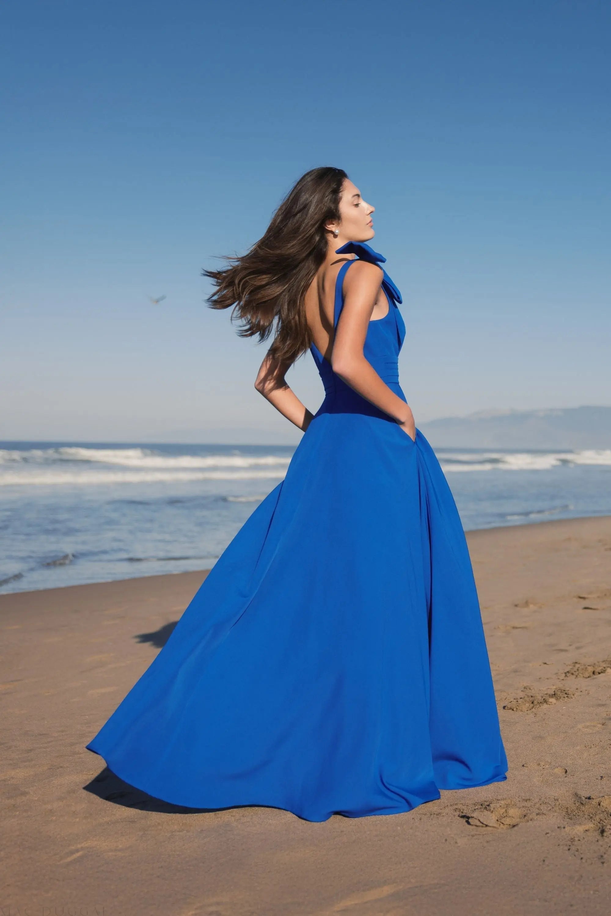 Blue Sleeveless Plunge Neck Crepe Ballgown With Bow Detail