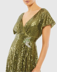 Green Sequined Butterfly Sleeve Wrap Over A Line Gown